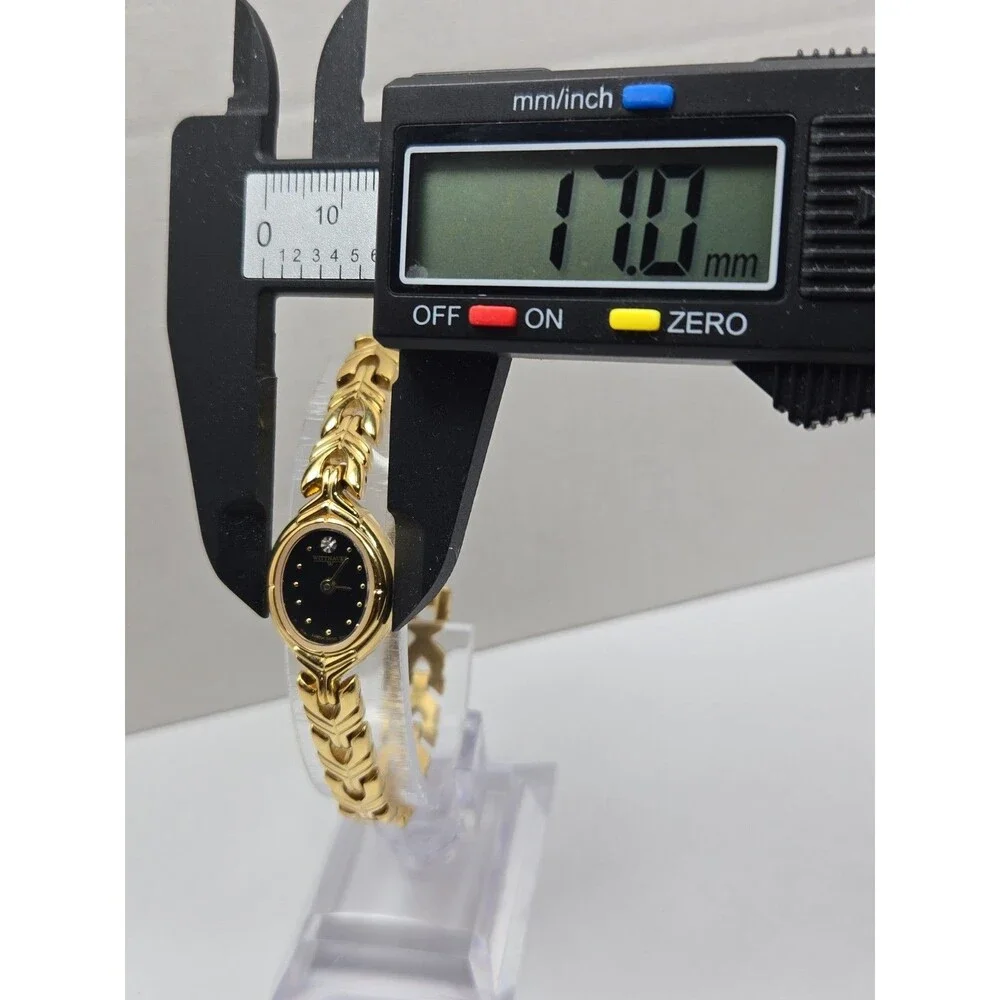 Wittnauer LU8034 Womens Swiss Quartz Gold Tone Black Dial Oval Watch New Battery